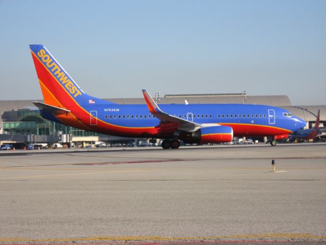 Boeing 737-700 (N753SW) - Holding on RWY 19R