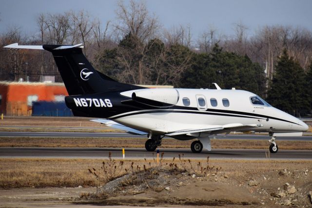 Embraer Phenom 100 (N670AS) - N670AS taxiing via Delta to Runway 23 at Buffalo (KBUF) before heading off to Cleveland (KBKL) as XSR670