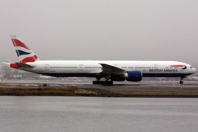 BOEING 777-300ER (G-STBK) - British Airways B777-300 arriving to a rainy/foggy Boston Logan looked to be a sub for usual B772/B787 on 3/19/22. 