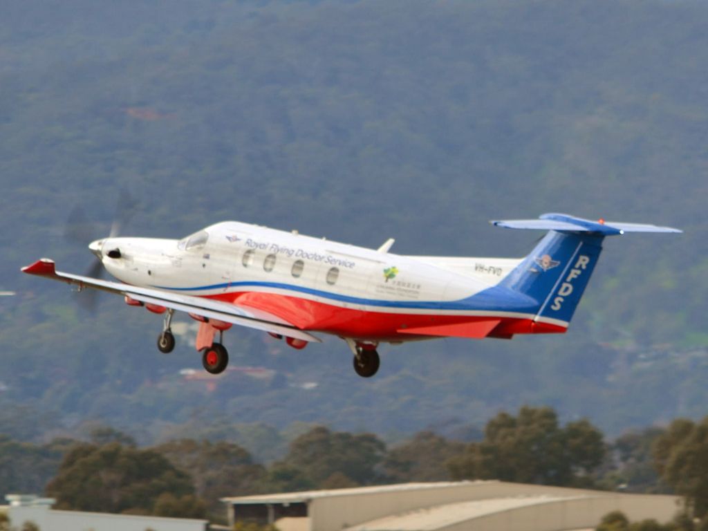 Pilatus PC-12 (VH-FVD) - Getting airborne off runway 05. Thursday 12th July 2012.