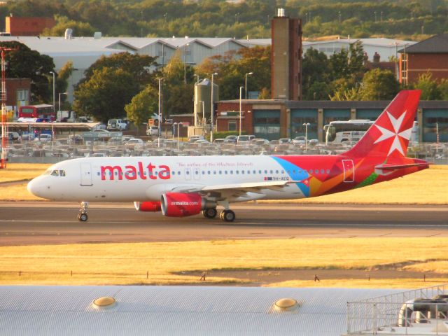 Airbus A320 (9H-AEQ) - Air Malta (KM) 9H-AEQ A320-214 [cn3068]br /London Heathrow (LHR). Air Malta flight KM102 just arrived from Valletta (MLA).br /Taken from Terminal 3 Car Parkbr /2013 08 19  a rel=nofollow href=http://alphayankee.smugmug.com/Airlines-and-Airliners-Portfolio/Airlines/EuropeanAirlineshttps://alphayankee.smugmug.com/Airlines-and-Airliners-Portfolio/Airlines/EuropeanAirlines/a