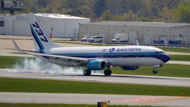 Boeing 737-800 (N276EA) - Eastern 737-8AL touching down on 28L at KCMH 5-2-15. This aircraft is named "Spirit of Captain Eddie Rickenbacker"