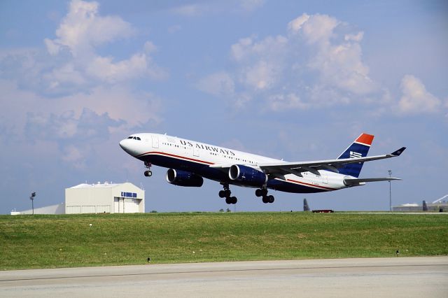 Airbus A330-200 (N281AY) - This A330 is departing Charlotte, North Carolina for a non-stop flight to LIRF (Rome, Italy) in late June 2010.