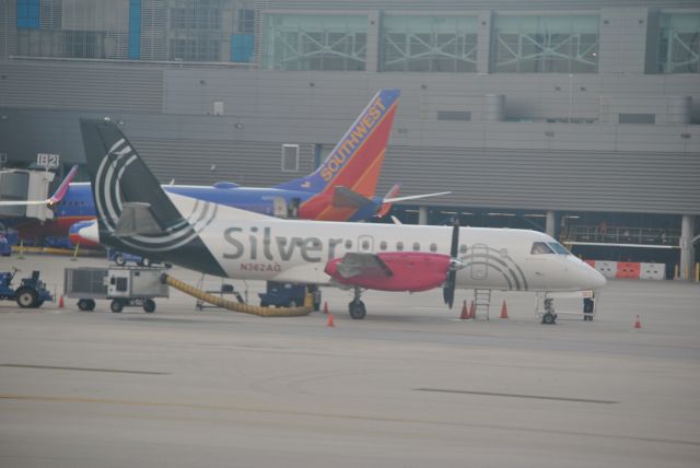 Saab 340 (N362AG) - Silver Airways, SAAB 340B, being serviced near Terminal 2 at KFLL...