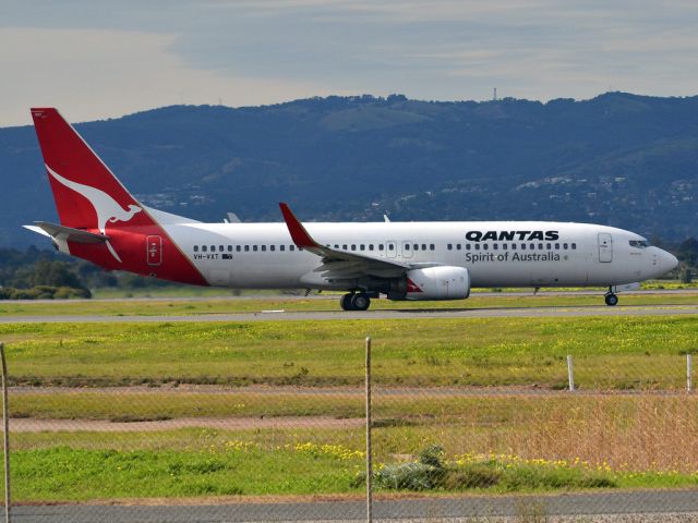 Boeing 737-800 (VH-VXT) - On taxi-way heading for take off on runway 05. Thursday 12th July 2012.