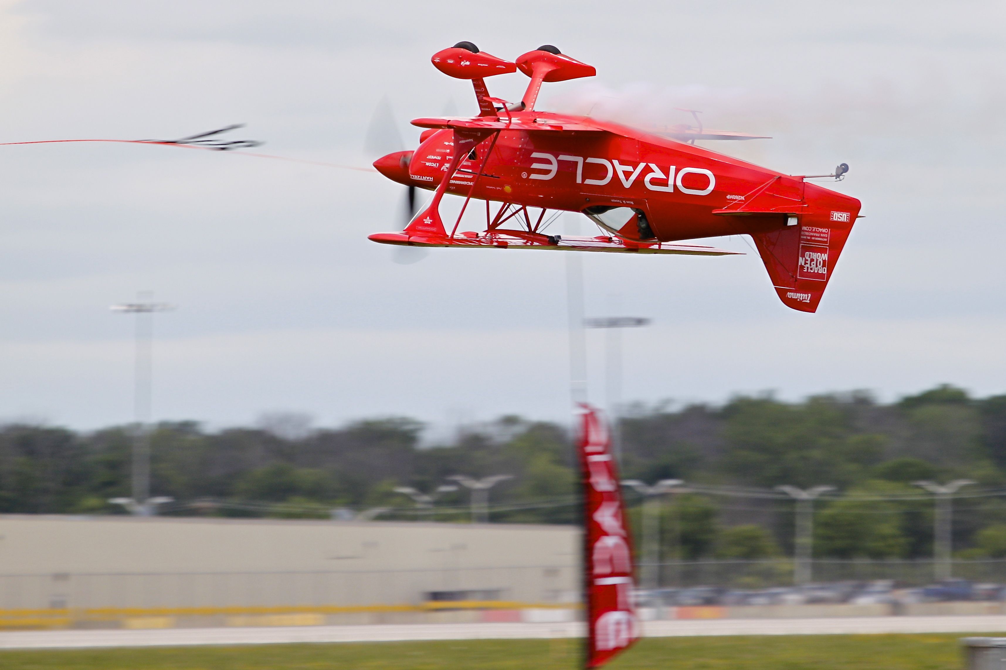 Experimental 100kts-200kts (N260HP) - Sean Tucker cutting a ribbon at the Dayton Air Show