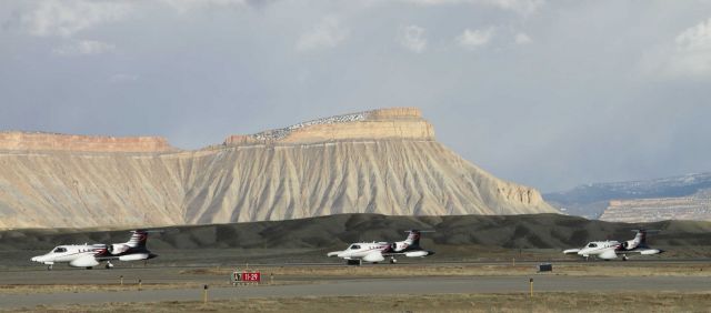 Learjet 35 (N136DH) - One of my better stitches, against the backdrop of Mt Garfield - MRK at the helm.