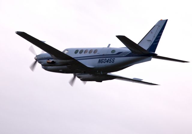 Beechcraft King Air 100 (N6045S2) - Take off RW08. An older King Air 100 but still in good shape.