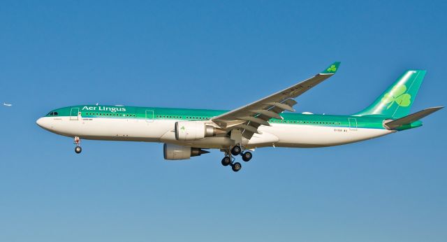 Airbus A330-300 (EI-EAV) - St. Ronan on final for 4R as AF338 is on a downwind on FlightAware.Com !