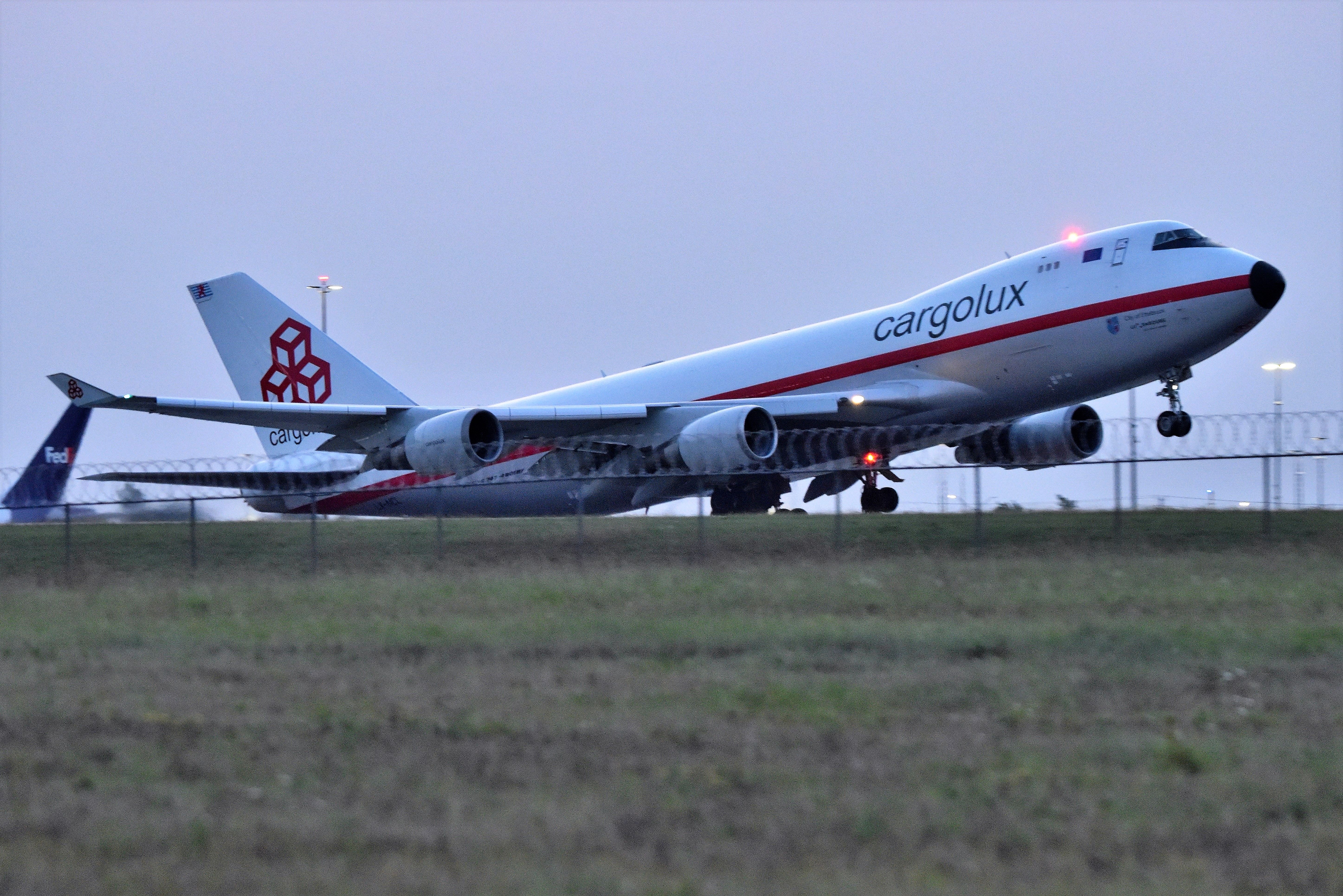 Boeing 747-400 (LX-NCL) - Departing 23-L on 09-12-21 at dawn, about six minutes prior to official sunrise