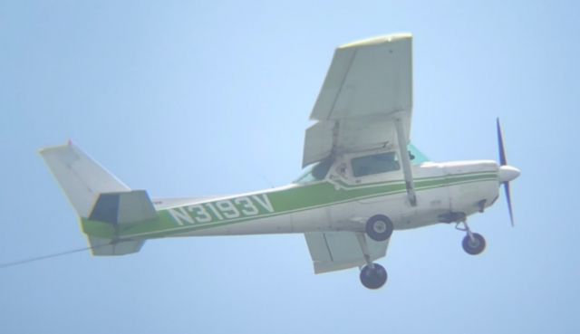 Cessna Commuter (N3193V) - N3193V Cruising along the Jersey Shore line, Seaside Heights (Advertising Jersey Blueberries Banner)