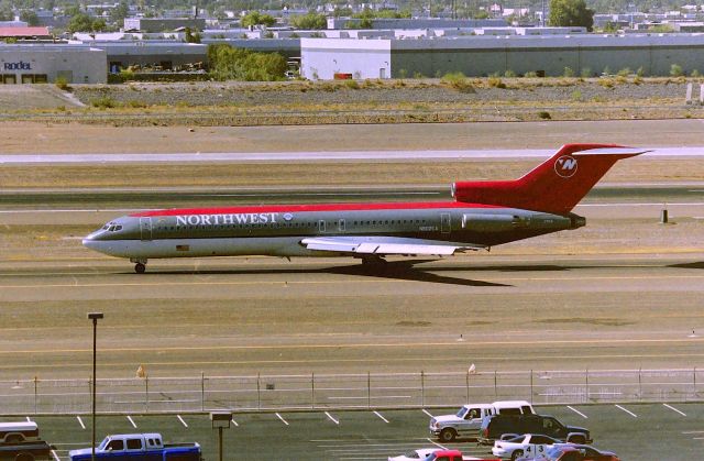 BOEING 727-200 (N802EA) - KPHX - April 1999 with Northwest 727 on taxi to the main runways...