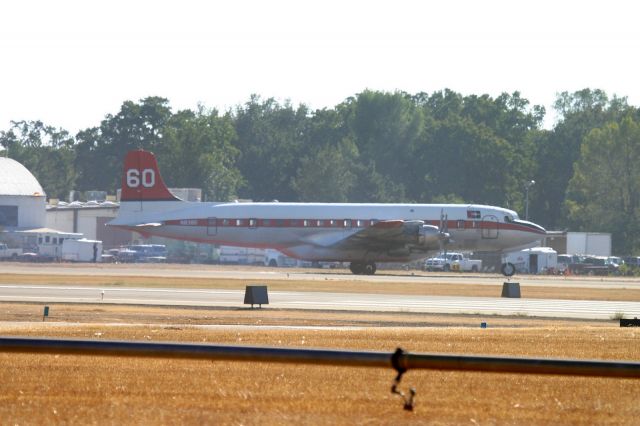 Douglas DC-7 (N838D) - KRDD - Tanker 60 rolling to the hot load zone at Redding for more juice to help fight the Boles Fire at Weed,CA Sept 2014.