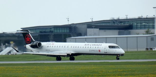 Canadair Regional Jet CRJ-900 (C-FJZL) - Shown here is a 2016 Air Canada Express Mitsubishi Canadair Regional Jet 900LR in the Spring of 2024.