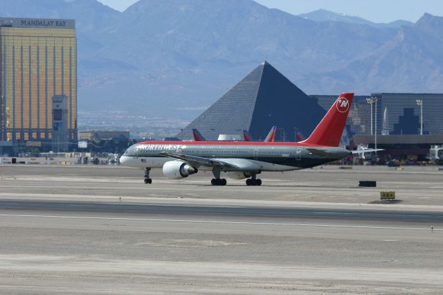 Boeing 757-200 (N521US) - KLAS - Northwest 757-200 on taxi between Runways 25LR 3/31/2005 at Las Vegas. click fullbr /br /Serial number 23209 LN:110br /Type 757-251br /First flight date 14/11/1986