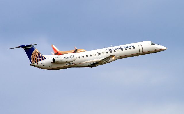 N15555 — - Continental Express Embraer 145LR and a Southwest 737 "classic" colors climb out of Nashville, TN