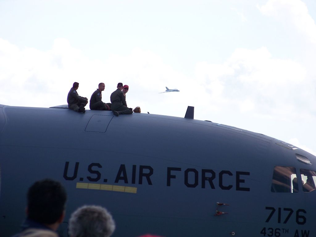 Boeing Globemaster III (N7176) - September 2009: Flight crew sitting on top of their C-17 Globemaster III. In the background the Avro Vulcan shows up.