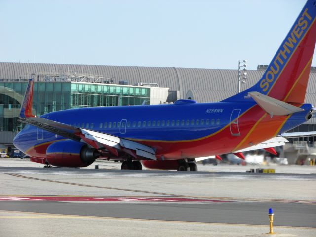 Boeing 737-700 (N258WN) - Taxiing to gate.