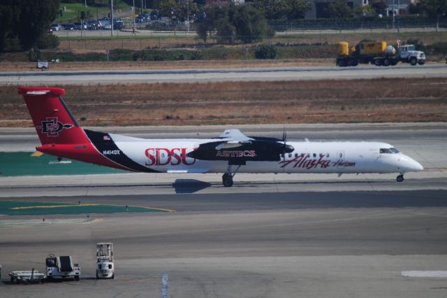 de Havilland Dash 8-400 (N414QX) - A new college livery on this machine!  SDSU--San Diego State Univ.--as seen leaving KLAX recently.