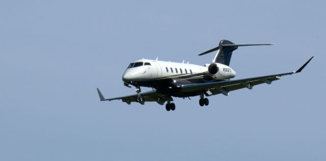 Canadair Challenger 350 (N565FX) - On short final is this 2021 Bombardier Challenger 350 in the Summer of 2023.