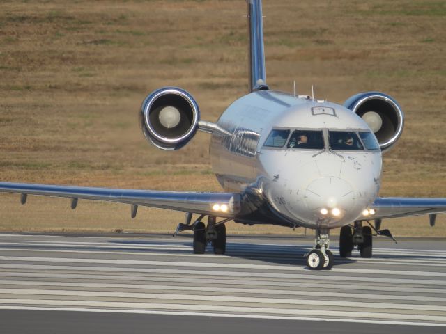 Canadair Regional Jet CRJ-200 (N249PS) - Taken at airport overlook Dec. 1, 2013