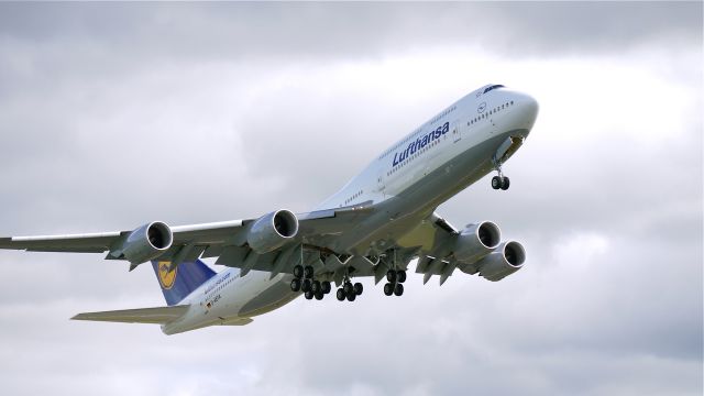 BOEING 747-8 (D-ABYA) - DLH9876 climbs from runway 16R for a short flight to Vancouver Intl (CYVR) on 4/28/12.