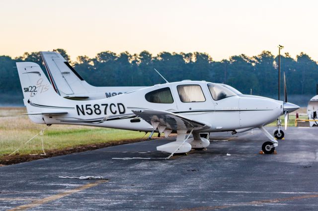 Cirrus SR-22 (N587CD) - Tied down during an early morning dew.