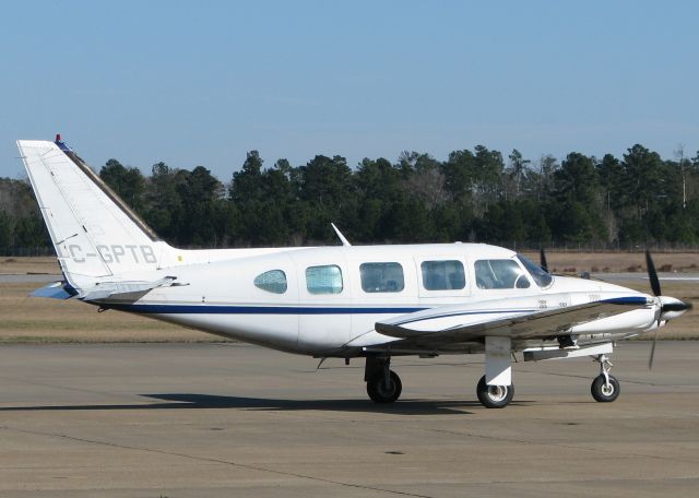 Piper Navajo (C-GPTB) - Taxiing at Longview,TX.