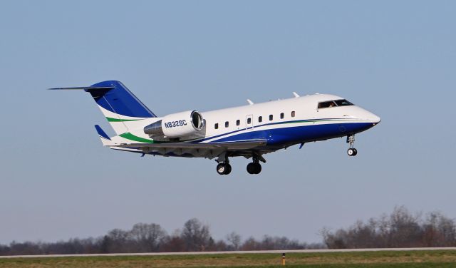 Canadair Challenger (N832SC) - N832SC shortly after rotation from runway 04 headed to Burlington, VT. KBVT.