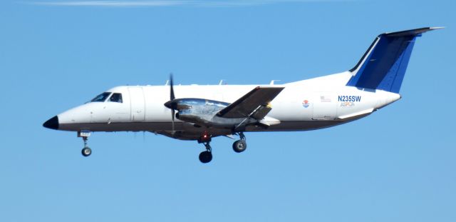 Embraer EMB-120 Brasilia (N235SW) - On short final is this 1996 Embraer 120ER Brasilia in the Winter of 2023. 