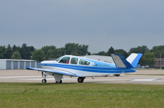 Beechcraft 35 Bonanza (N24AG) - Bonanza mass arrival at AirVenture 2014