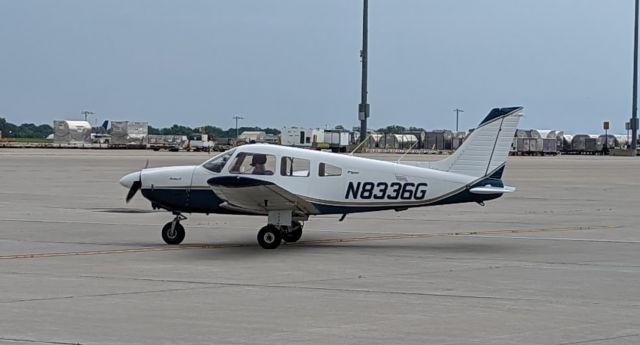 Piper Cherokee (N8336G) - On the Signature FBO tarmac, N8336G taxiing to a flight lesson.