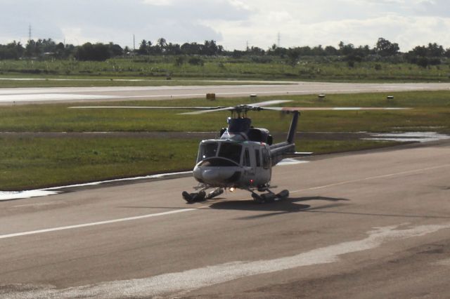 HELI — - A helicopter sitting on the taxiway. Taken from our American Airlines Boeing 767-323ER, flight 1668, on December 10, 2012.