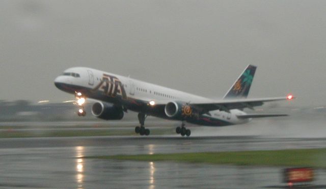 — — - Taken from the left seat of a Continental 737 while taxing out for departure years ago, "caught him just a lift off."