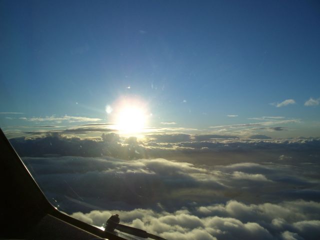 Boeing 777-200 — - Sunset somewhere in the world.