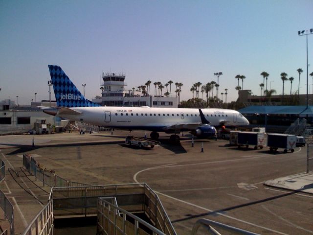 Embraer ERJ-190 (N247JB) - E190 sitting at SFO. Courtesy of JetBlue Jae