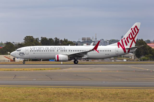 Boeing 737-800 (VH-YIS) - Virgin Australia (VH-YIS) Boeing 737-8FE(WL), fitted with Split Scimitar winglets, departing Sydney Airport.