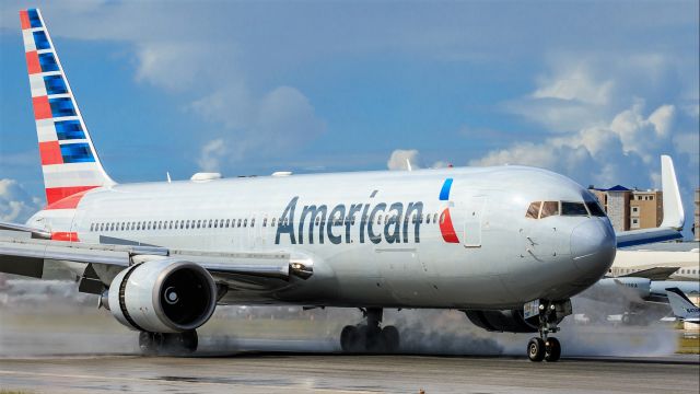 BOEING 767-300 (N397AN) - American Airlines N397AN blow drying the runaway at St Maarten. 31/12/2019