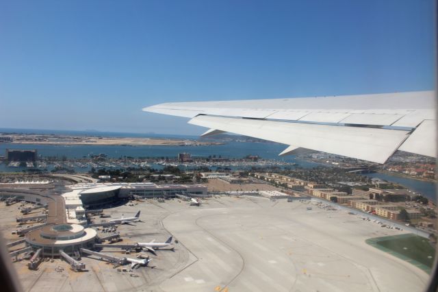 BOEING 767-300 (N127DL) - Taking off you can see parts of Point Loma and the newer, renovated terminal 2.