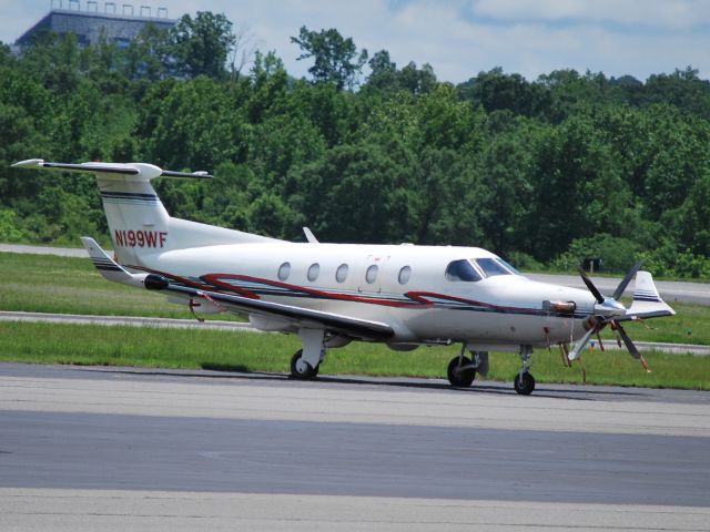 Pilatus PC-12 (N199WF) - Parked at Concord Regional Airport - 5/26/09  Registered Owner: CCMM LLC