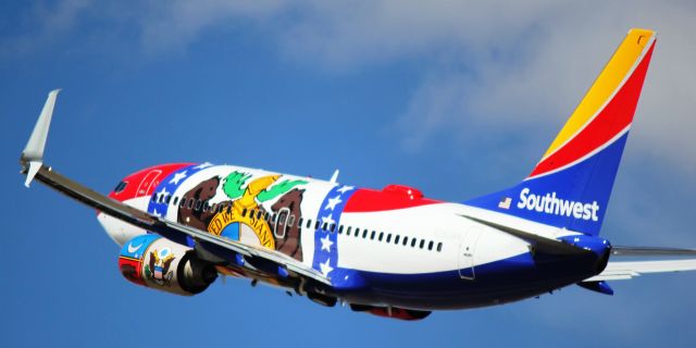 Boeing 737-700 (N280WN) - Departing from runway 25 for Tucson.