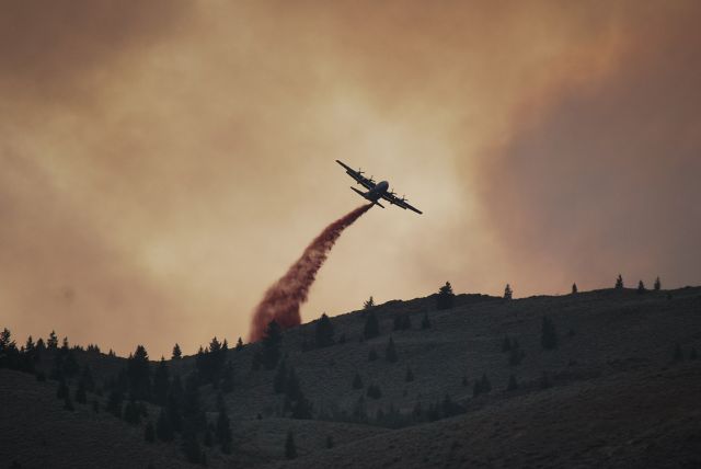 Lockheed C-130 Hercules — - C130 I think dropping fire retardant during the Beaver Creek fire in Blaine County Idaho summer 2013