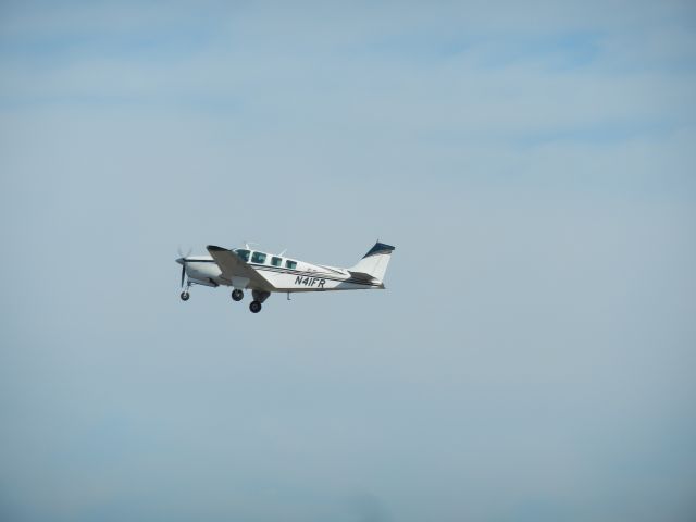 Beechcraft Bonanza (36) (N41FR) - A Beechcraft Bonanza Takes Off At Manassas Airport