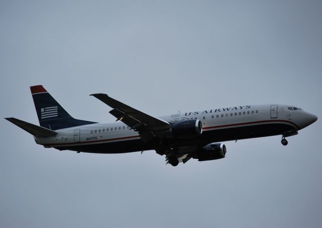 BOEING 737-400 (N417US) - Final for 36R - 9/18/11