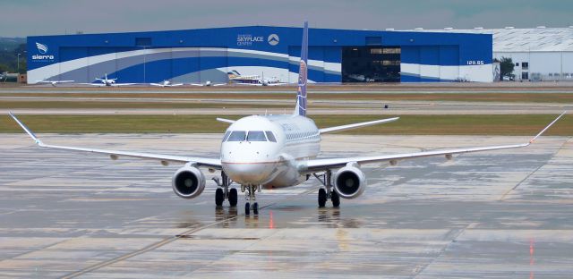 Embraer 170/175 (N109SY) - Taxiing to gate, new style winglets really stick out there.