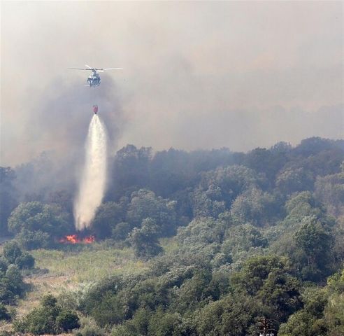 — — - USMC Camp Pendleton Helo's put into fire fighting action at request of Cal Fire. Huey's, CH-46's.