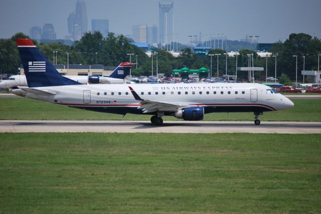 Embraer 170/175 (N123HQ) - Rolling down runway 18C - 6/28/09