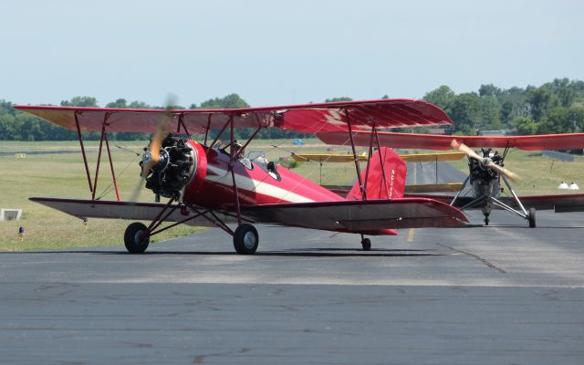 — — - 3 Meyers biplanes taxi to the west ramp at Lebanon, TN for a Meyers gathering.