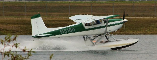 — — - Cessna 180 starting tocome up on plane.