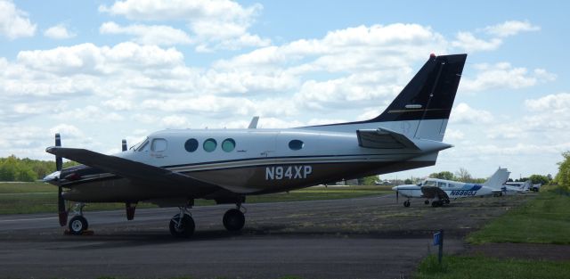 Beechcraft King Air 90 (N94XP) - Catching some tarmac time is this 1990 Beechcraft King Air C90A in the Spring of 2023.